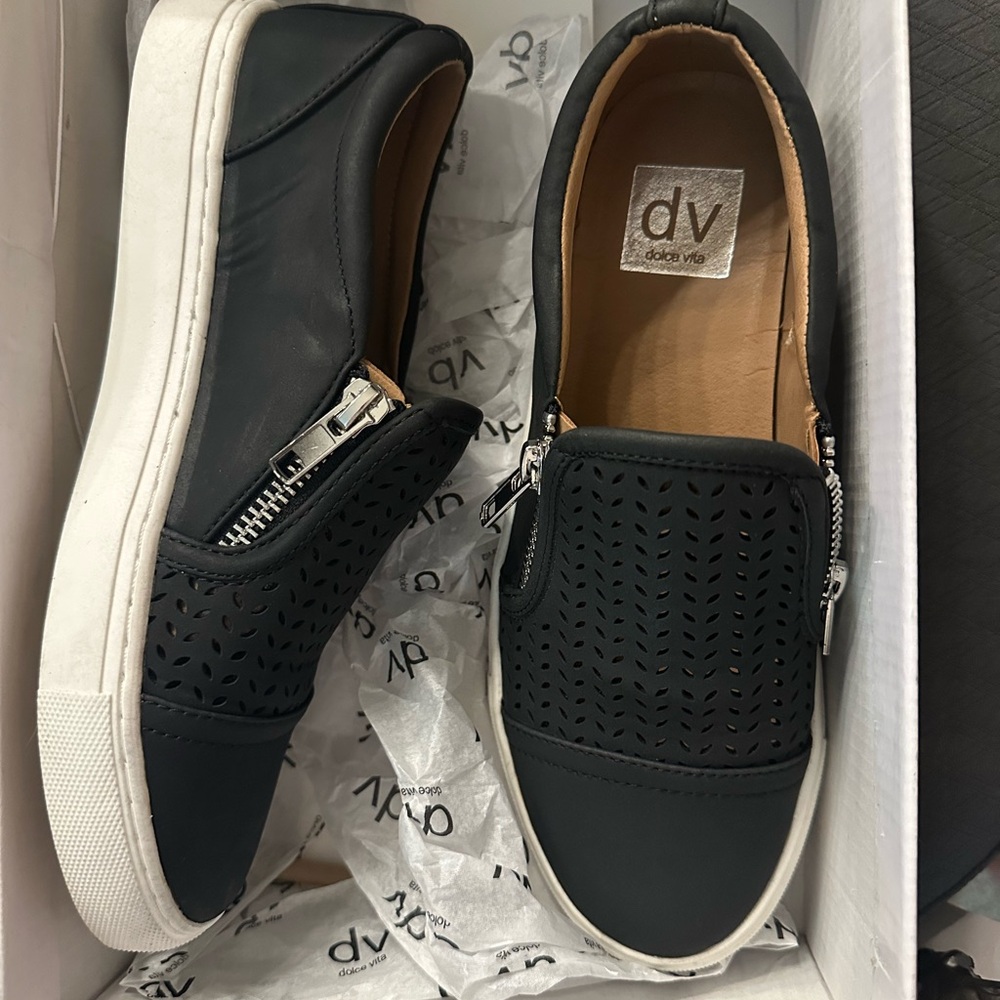 Dolce Vita Black Perforated Slip-On Sneakers
Size 6

WORN ONCE!!